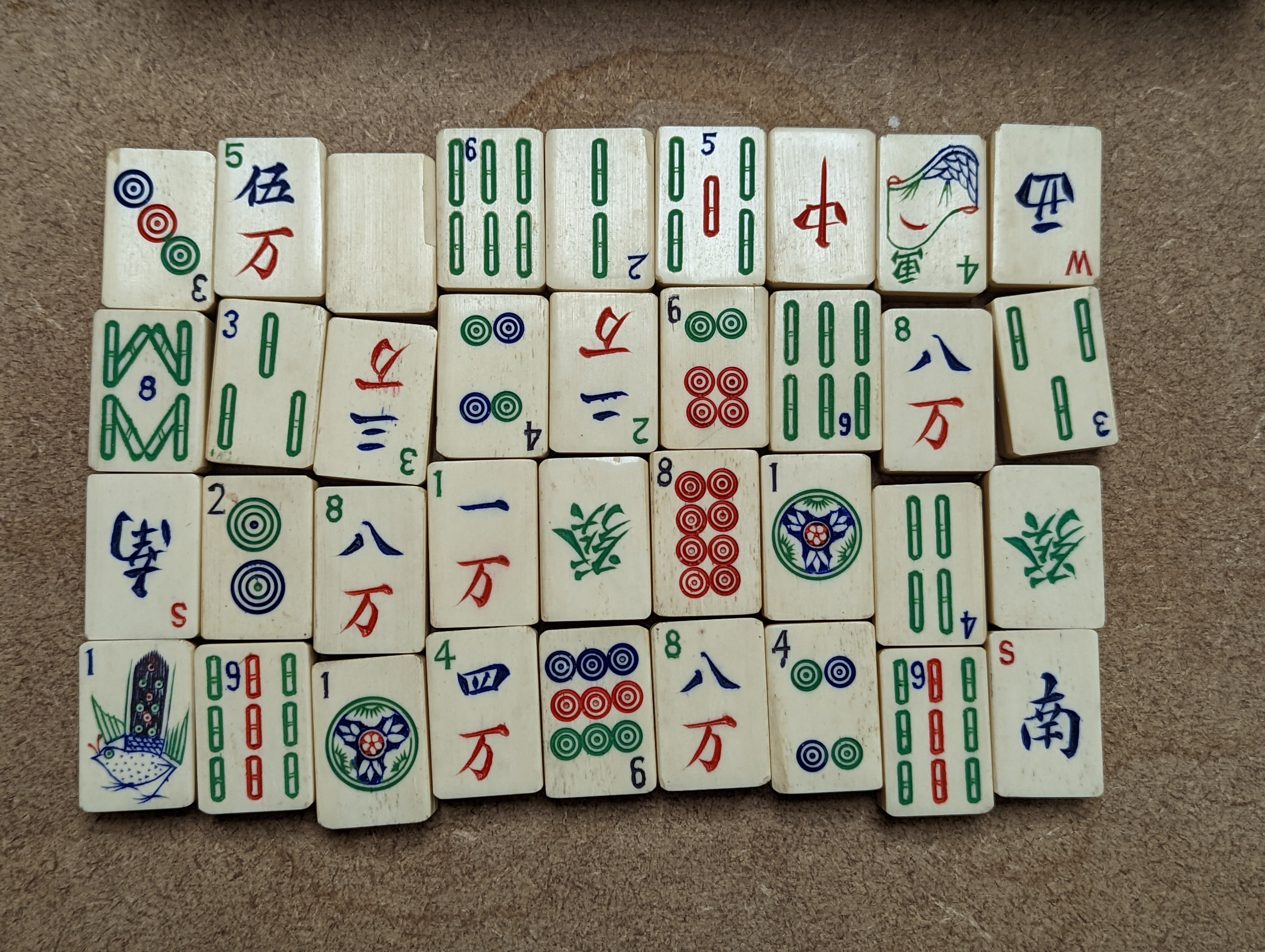 A Mah Jong set in wooden box, 17 cms high.